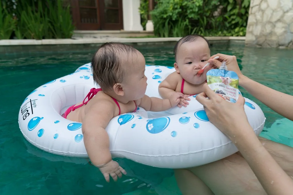 Mid-swim snack. Leia and Lauren never goes hungry!