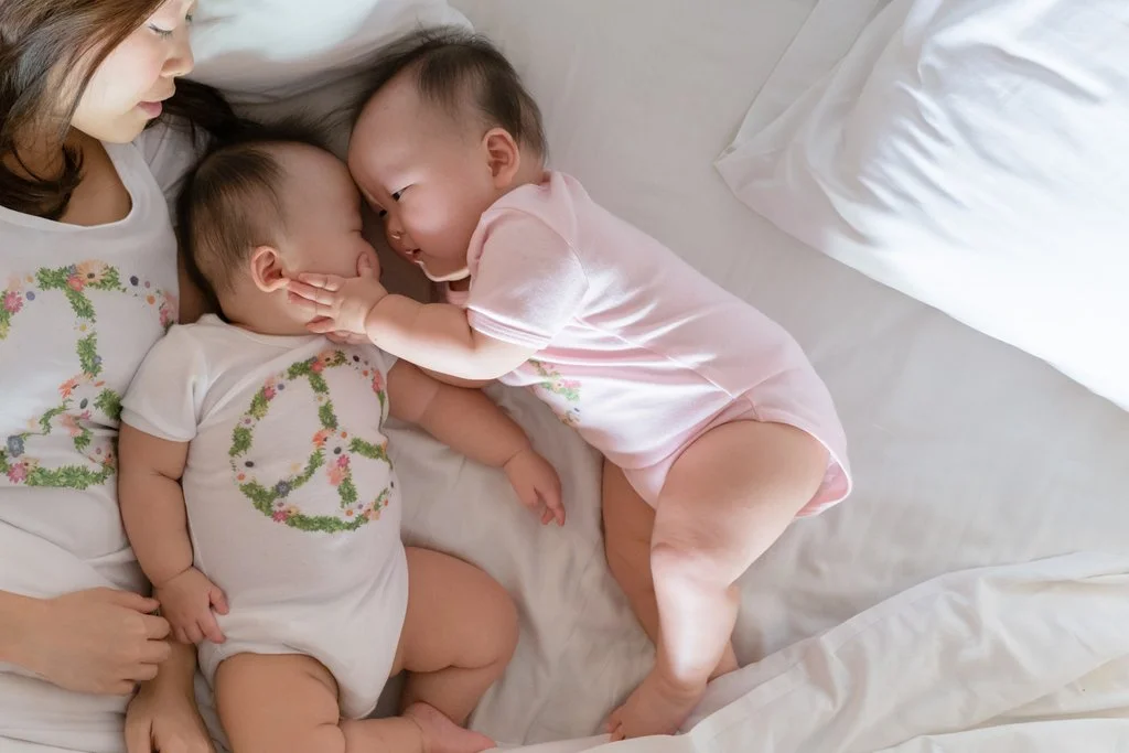 A tender moment of Lauren showering Leia with affection