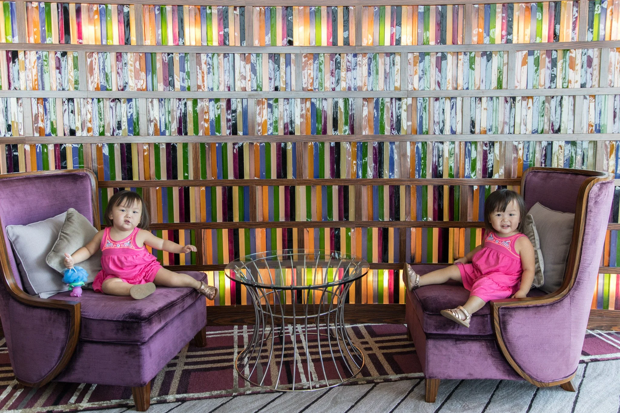 Loving the 'photo-worthy' colourful tiles that looks more like a whimsical library from afar.