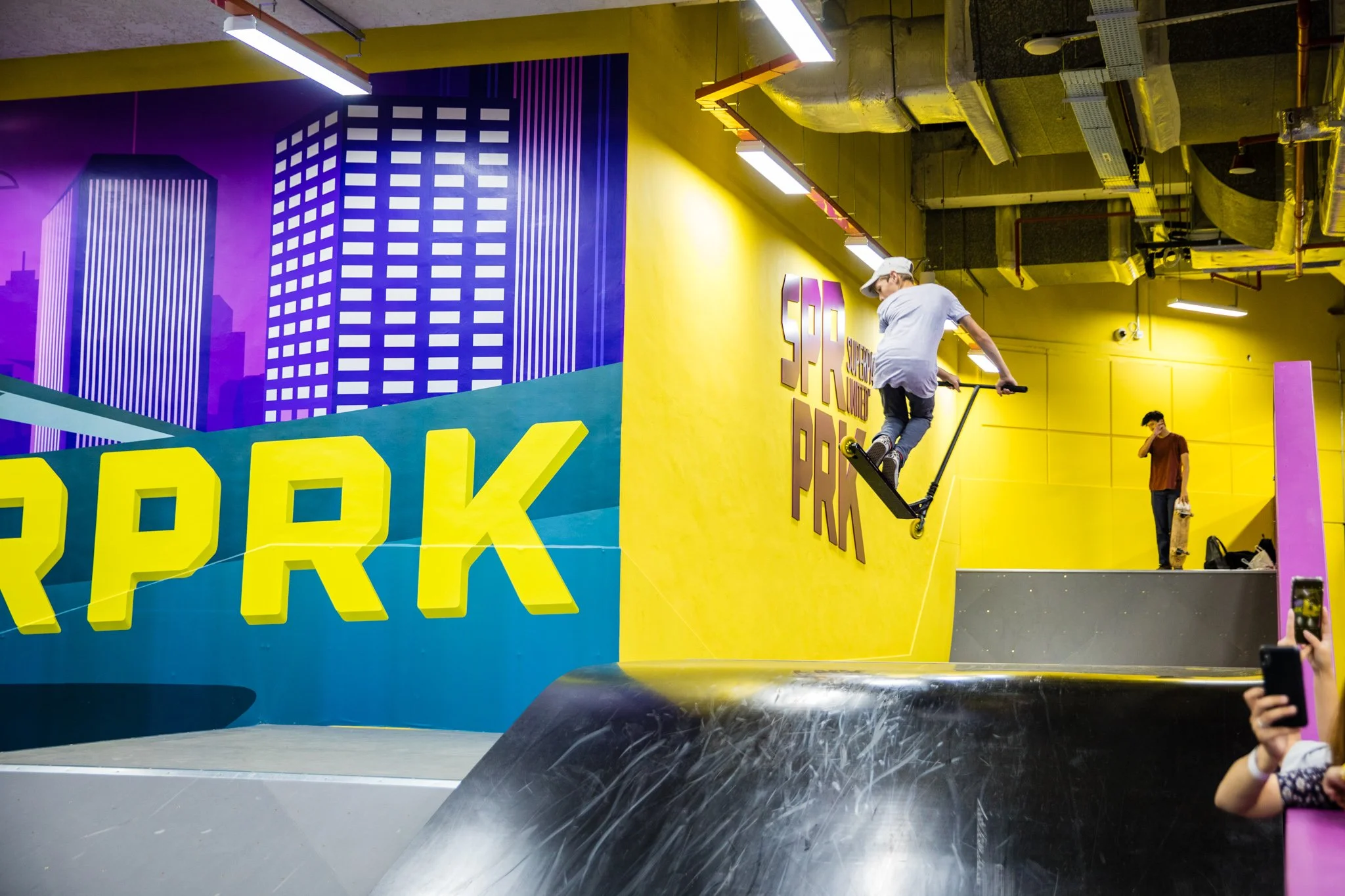 A dedicated skatepark for skaters and scooters to hone their skills.