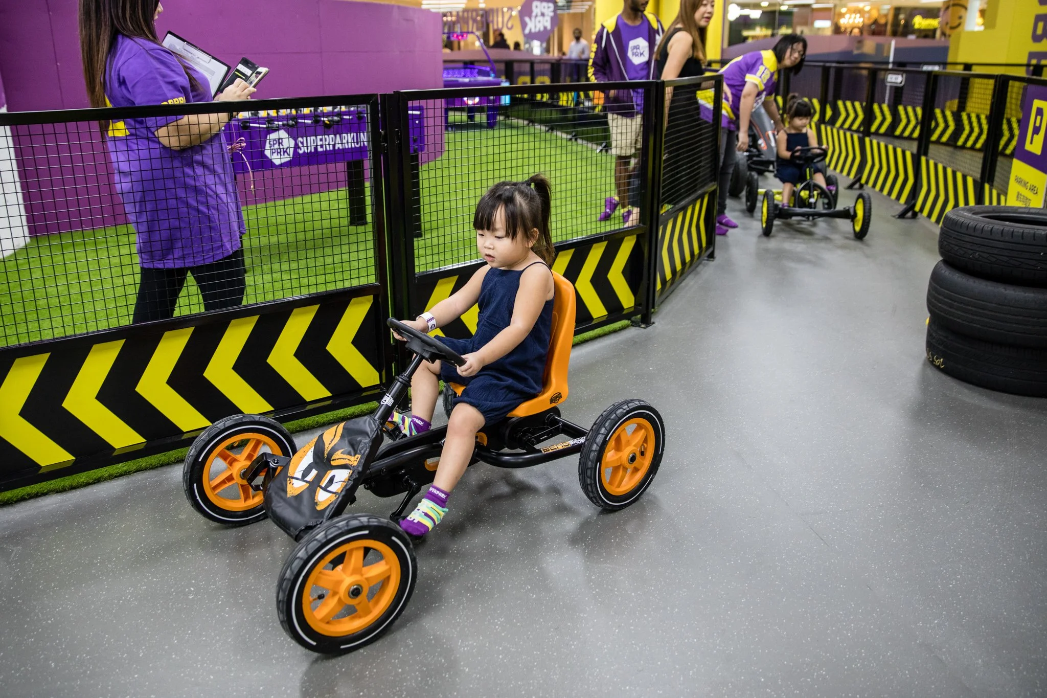 Race round the track with designated pedal cars for both adults and kids.