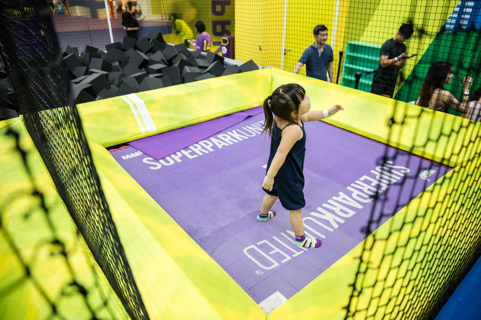 Having some freestyle fun in the adrenaline-pumped area that is complete with trampolines and climbing walls.