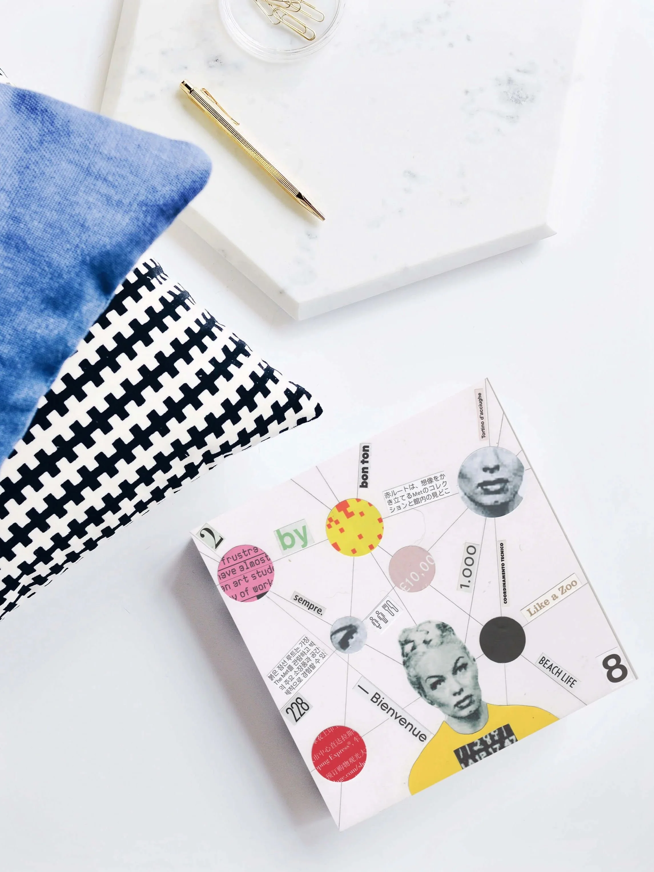 Traditional cut-and-assemble paper collage using reclaimed materials in a contemporary style.