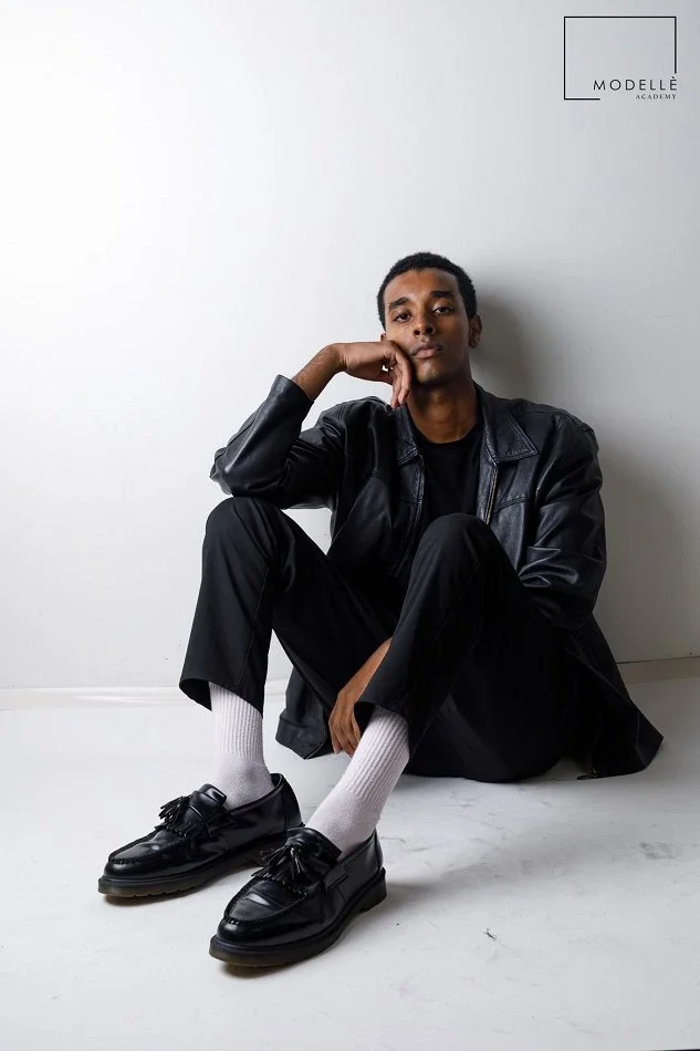 Male model demonstrating relaxed posing, confidence and versatility during a professional modelling photoshoot