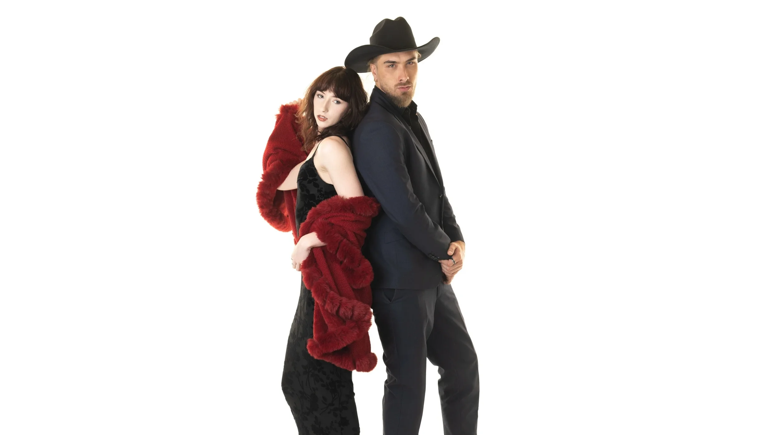 Aspiring male and female models posing confidently in stylish outfits during beginner modelling course photoshoot