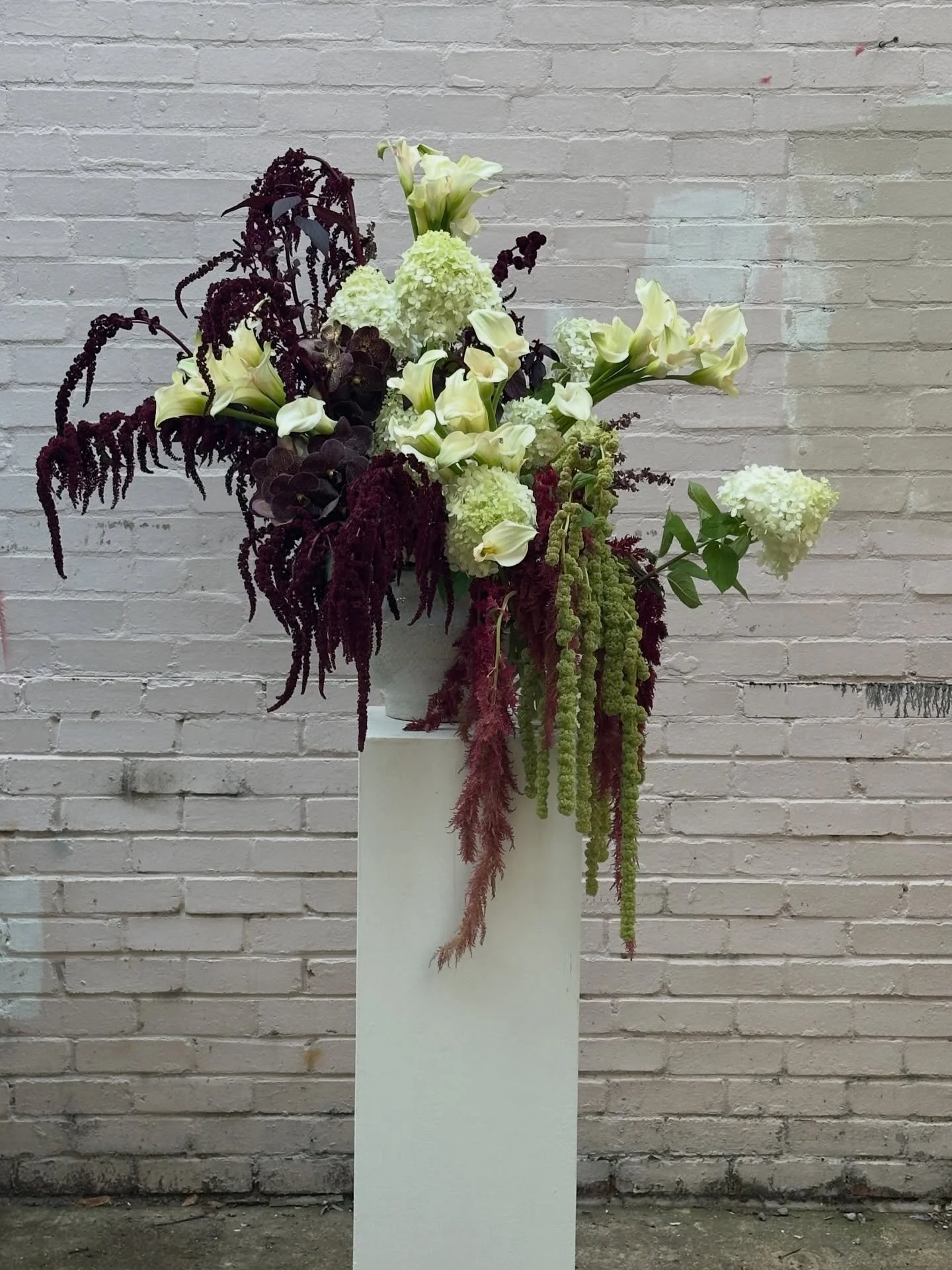 When @mwlbride let us loose in store and invited us to dress their bridal atelier in East London ✨ for a @charlottetilbury event last summer. 

We filled it with the most stunning burgundy and lime green english Amaranthus and Hydrangeas, clusters of