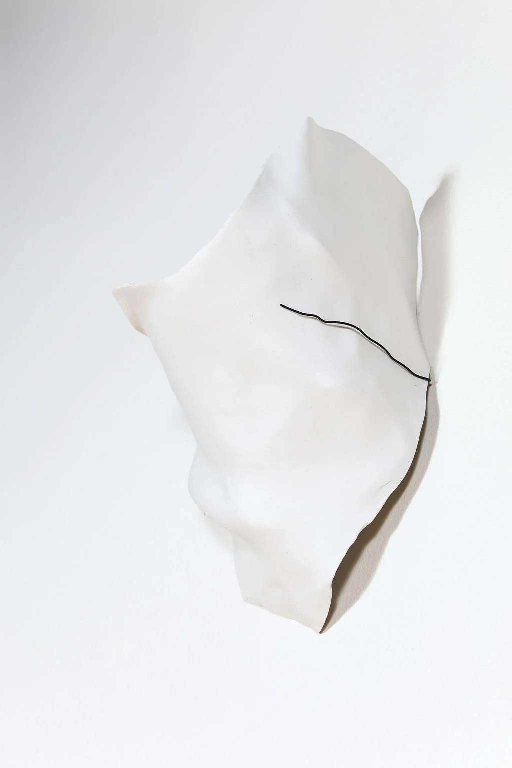 clay sculpture, 2025.  air clay and steel wire.