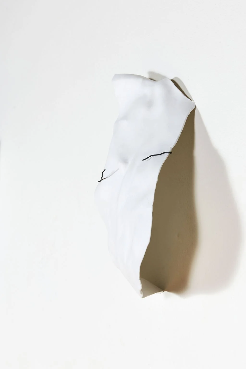 clay sculpture, 2025.  air clay and steel wire.