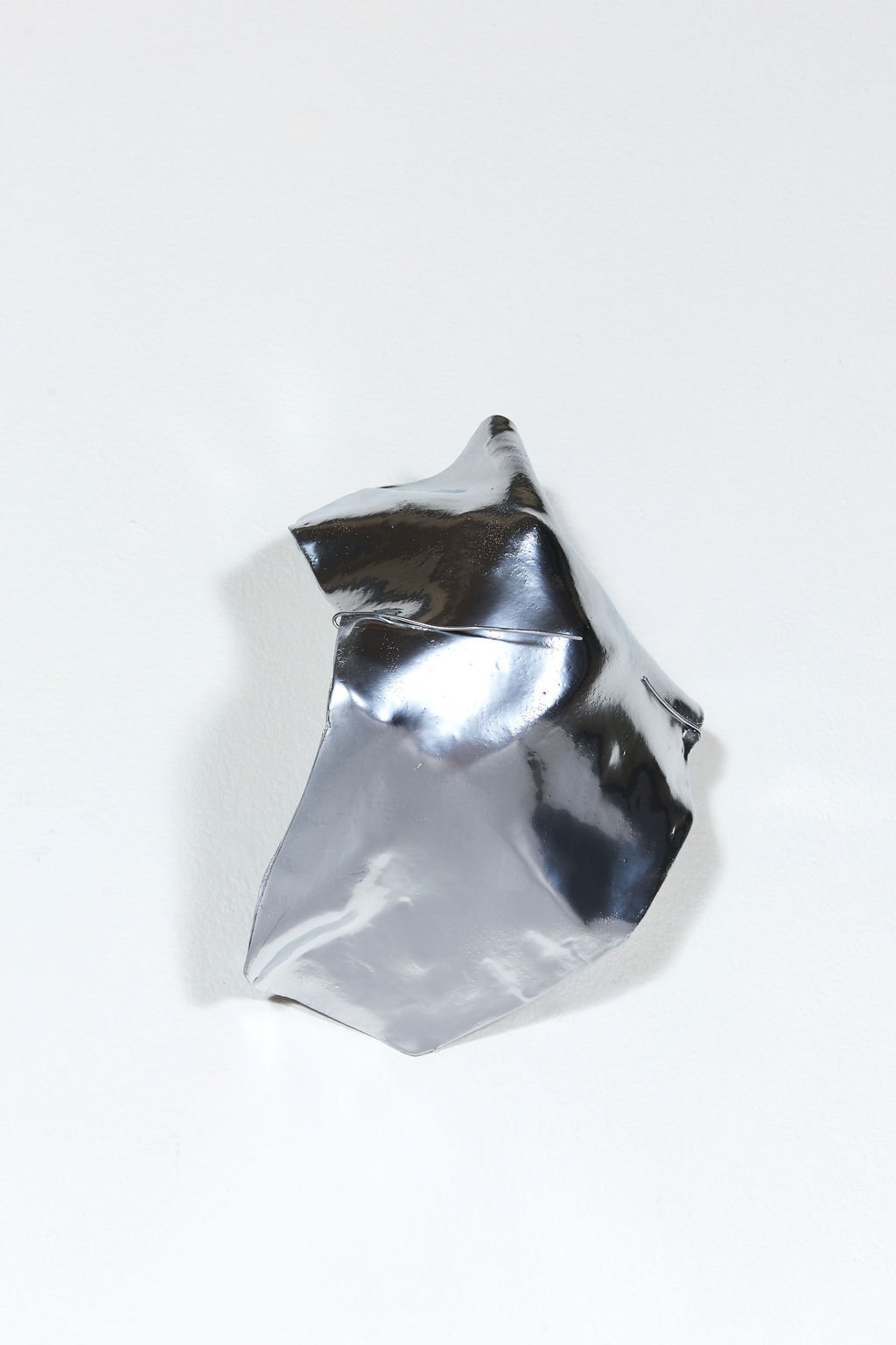 clay sculpture, 2025.  air clay, spray paint and steel wire.