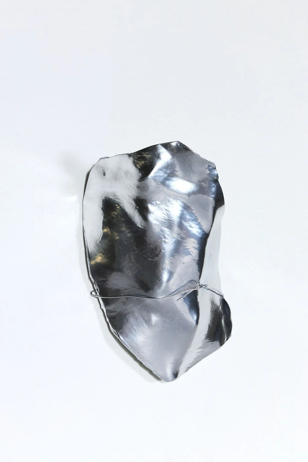 clay sculpture, 2025.  air clay, spray paint and steel wire.