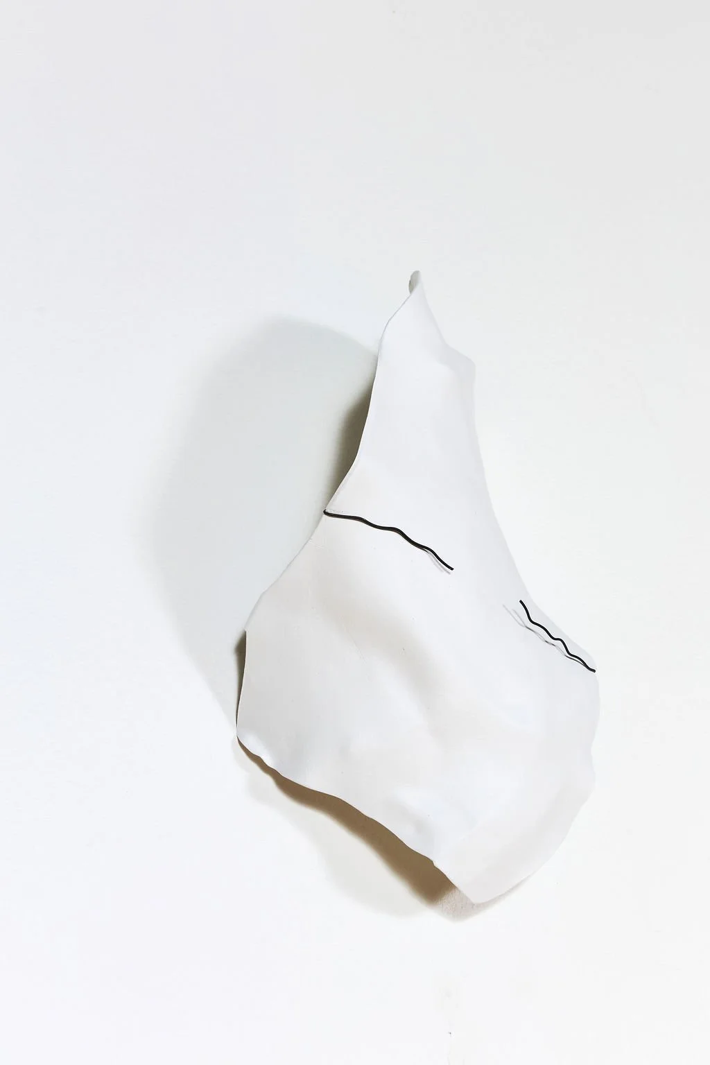 clay sculpture, 2025.  air clay and steel wire.