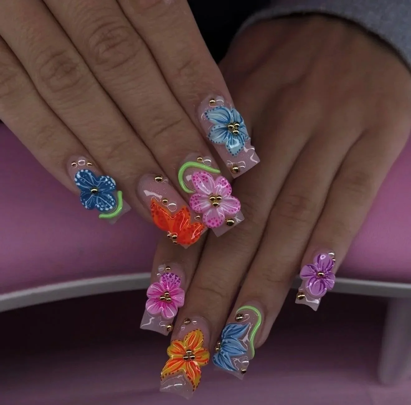 Acrylic nail designs by Nails By Paige, showcasing Paige’s technical skill and creative growth after training at Beautiful Luxe School of Cosmetology.