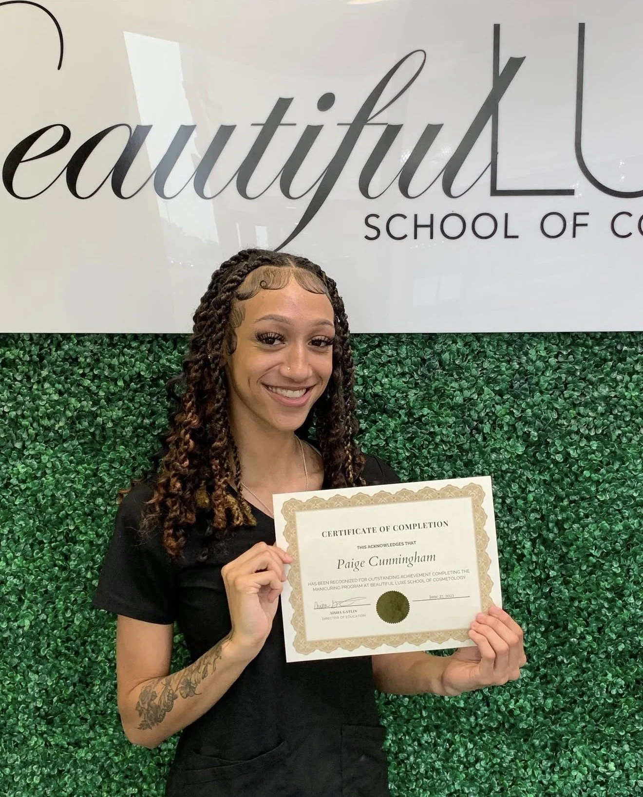 Paige smiling at Beautiful Luxe School of Cosmetology during her Nail Technology Program journey.