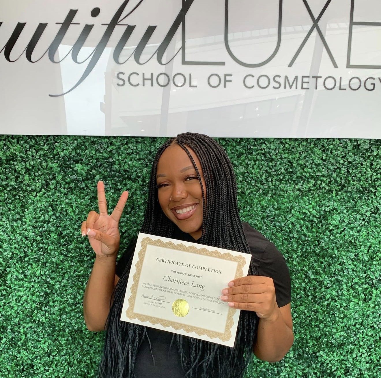 Portrait of Charniece Lang, founder of Sacred State Hair and Beautiful Luxe alumnus