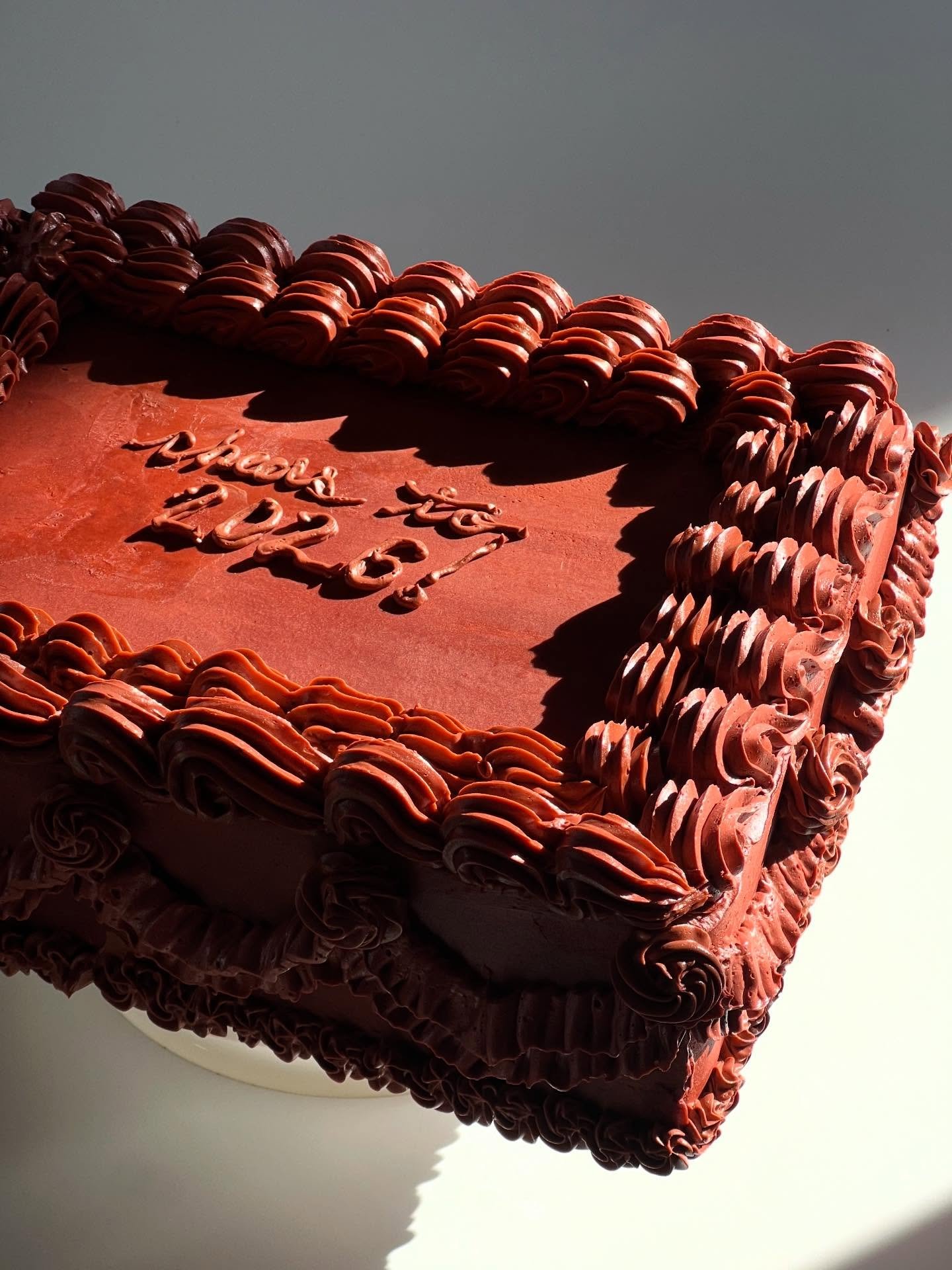 one final cake for 2025. chocolate chocolate cake with whipped ganache and olive oil buttercream for @rudemouthbk