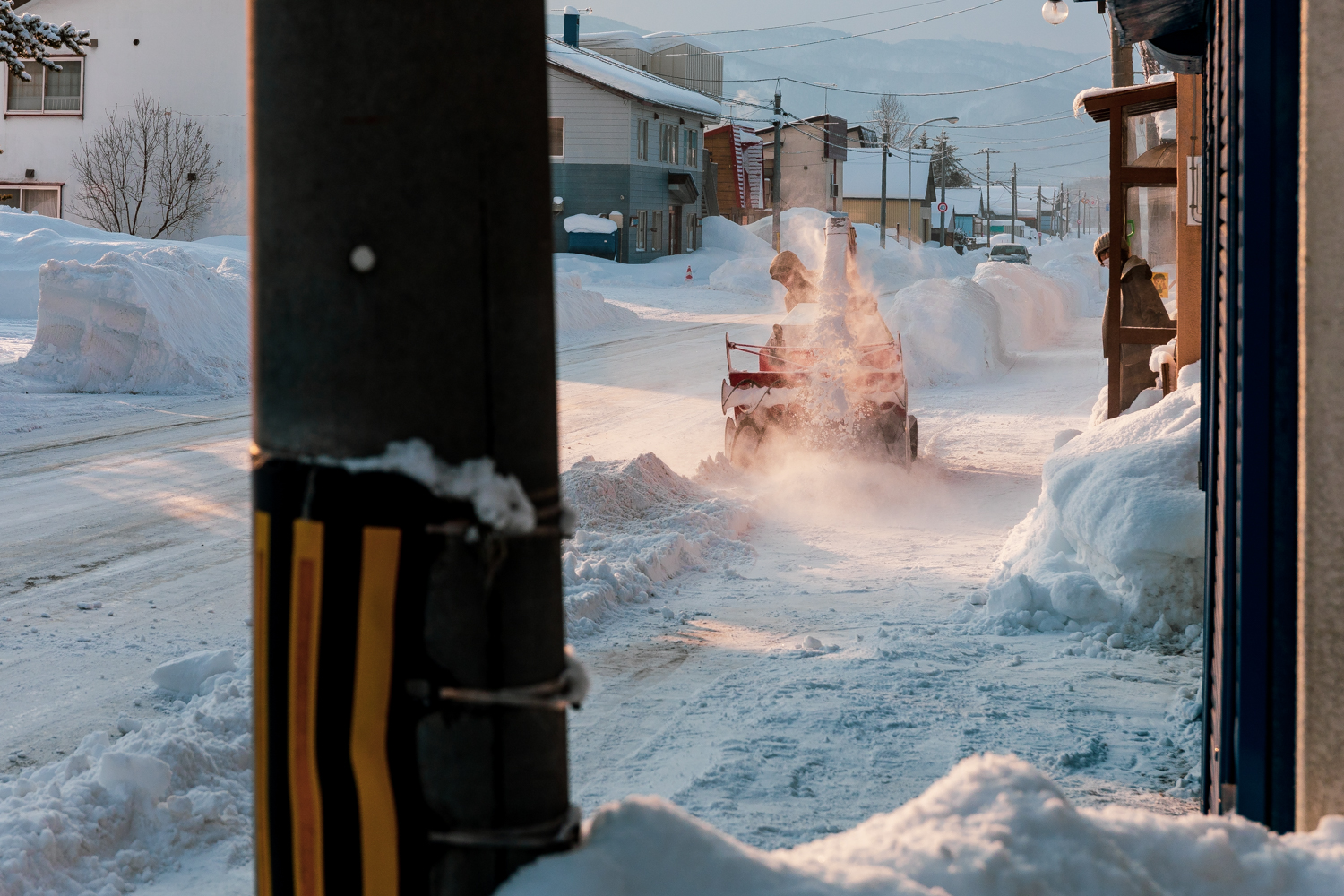 A constant process. The snowbanks in front of our house were removed every few days, or would have been falling into the living room.