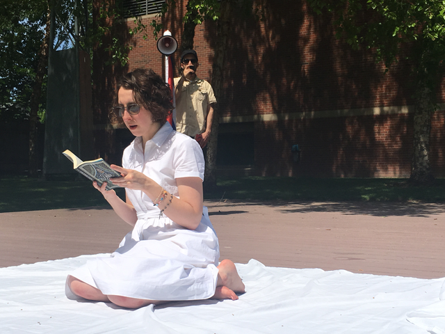   90 Miles  (performance at Whitman College), Dimensions &amp; Time Vary, Communist Manifesto, Peter Pan, White Cloth, Megaphone, &amp; Cuban Flag, 2016 Photo: Justin Lincoln 