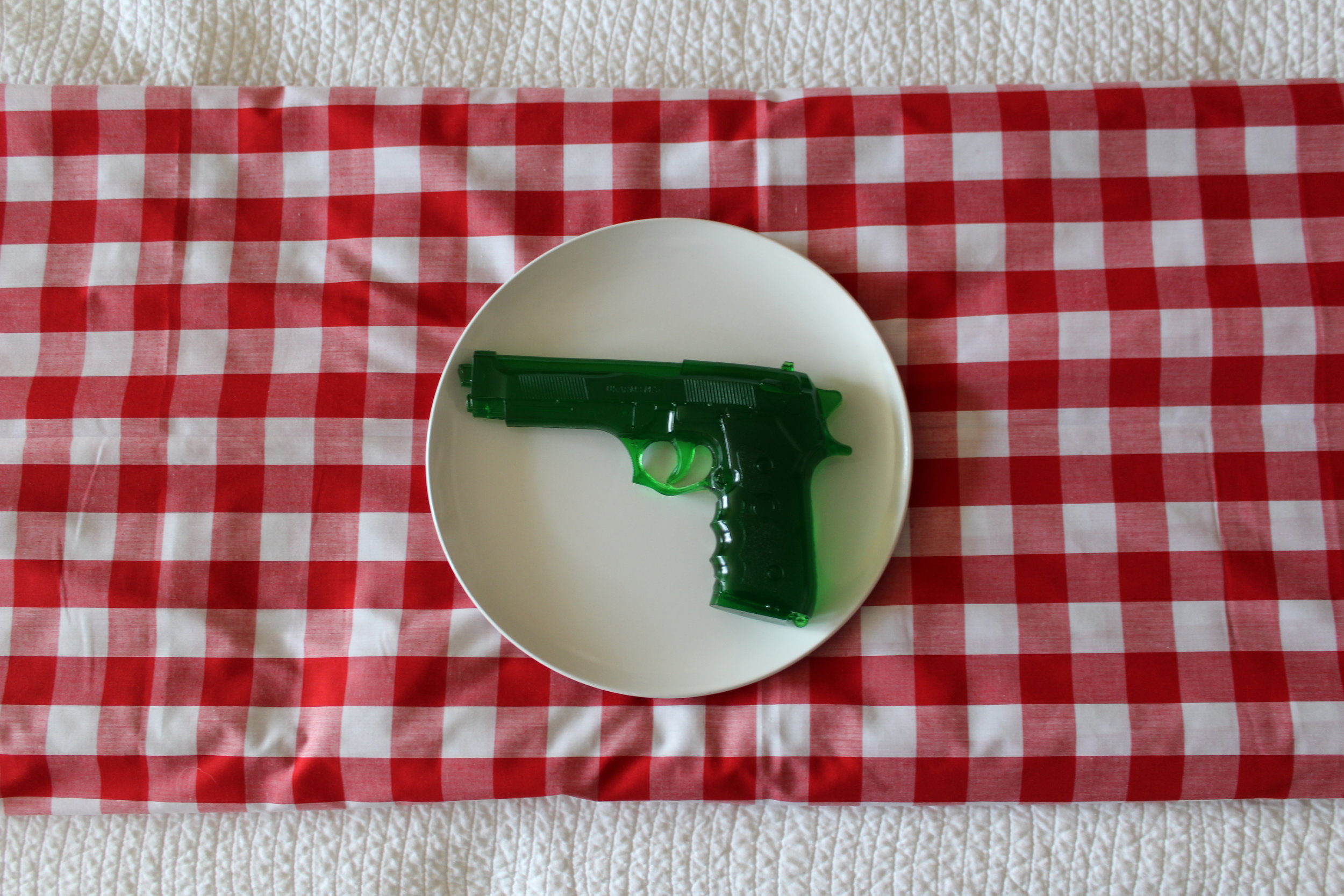   No You Shave  (detail), Jello Gun, Plate &amp; Gingham Tablecloth on Bed, 2015 Photo: Juventino Aranda 