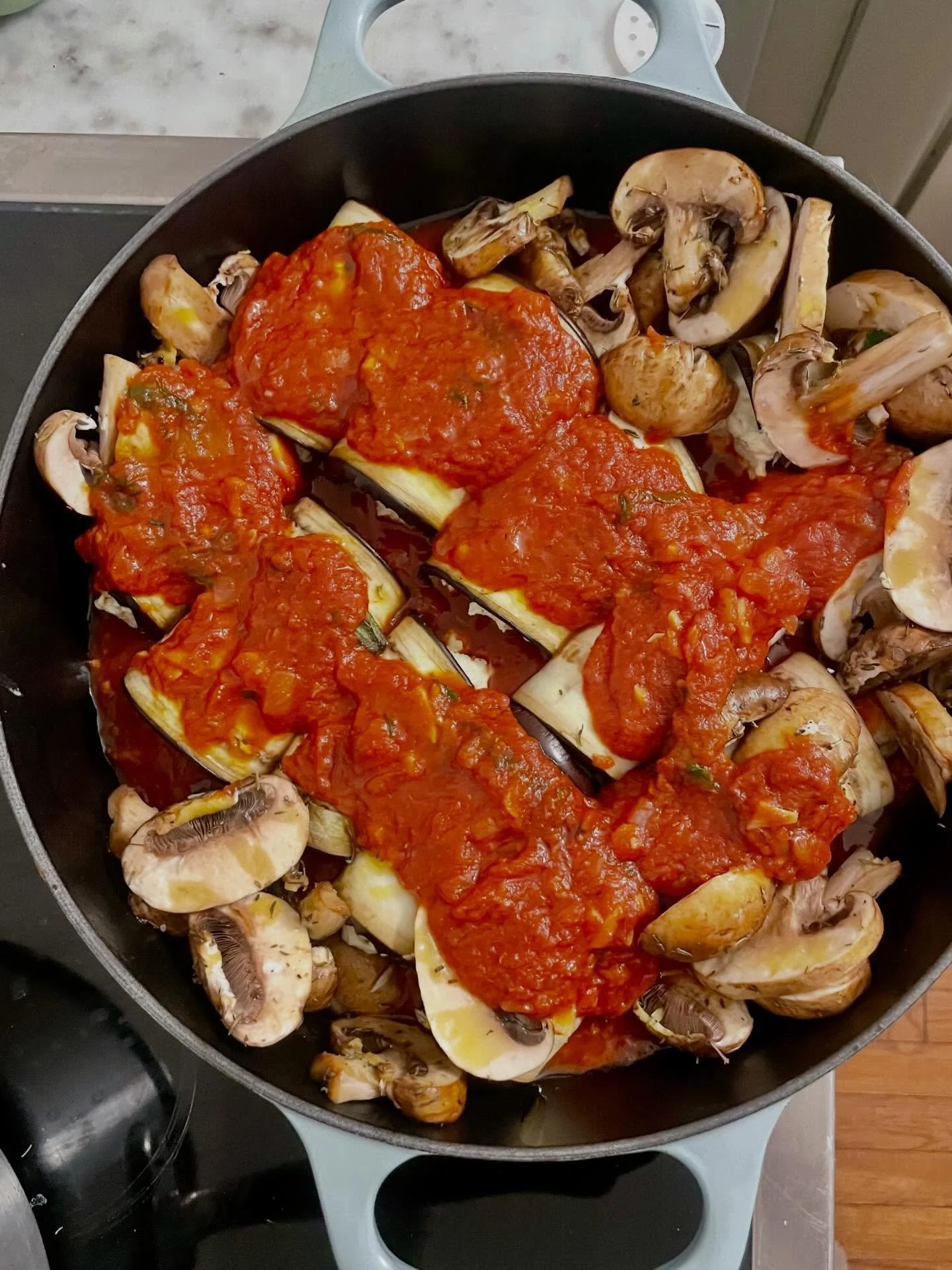 Made a pan of Involtini with my leftover cashew ricotta from the lasagna. My friend Kim used to make this dish for me when we would do movie + wine nights together. Roasted eggplant panels rolled w ricotta, lemon zest, herbs. I added mushrooms for mo