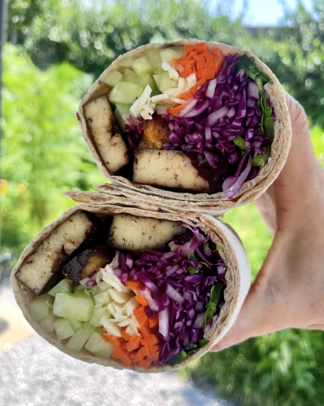  Rainbow lunch wrap at a plant based vegan and vegetarian cafe in New Orleans. Healthy organic options can be made gluten free 