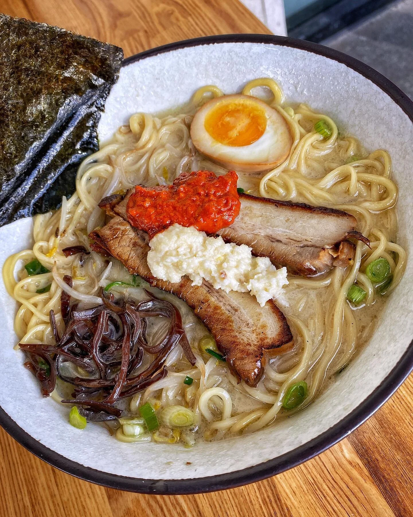 Garlic or Spicy Sauce, which do you prefer to have with our of Tonkotsu Ramen? 🔥😋 Use the link in our bio to order Takeout and Delivery from one of our locations or visit our Irvine location for Outside Dining‼️ #hironoriramen