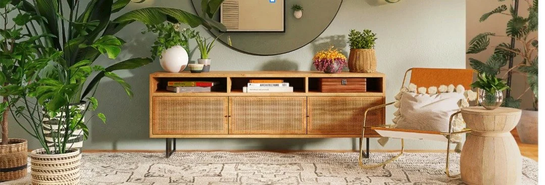 Calm therapy office with a rattan cabinet, plants and an armchair