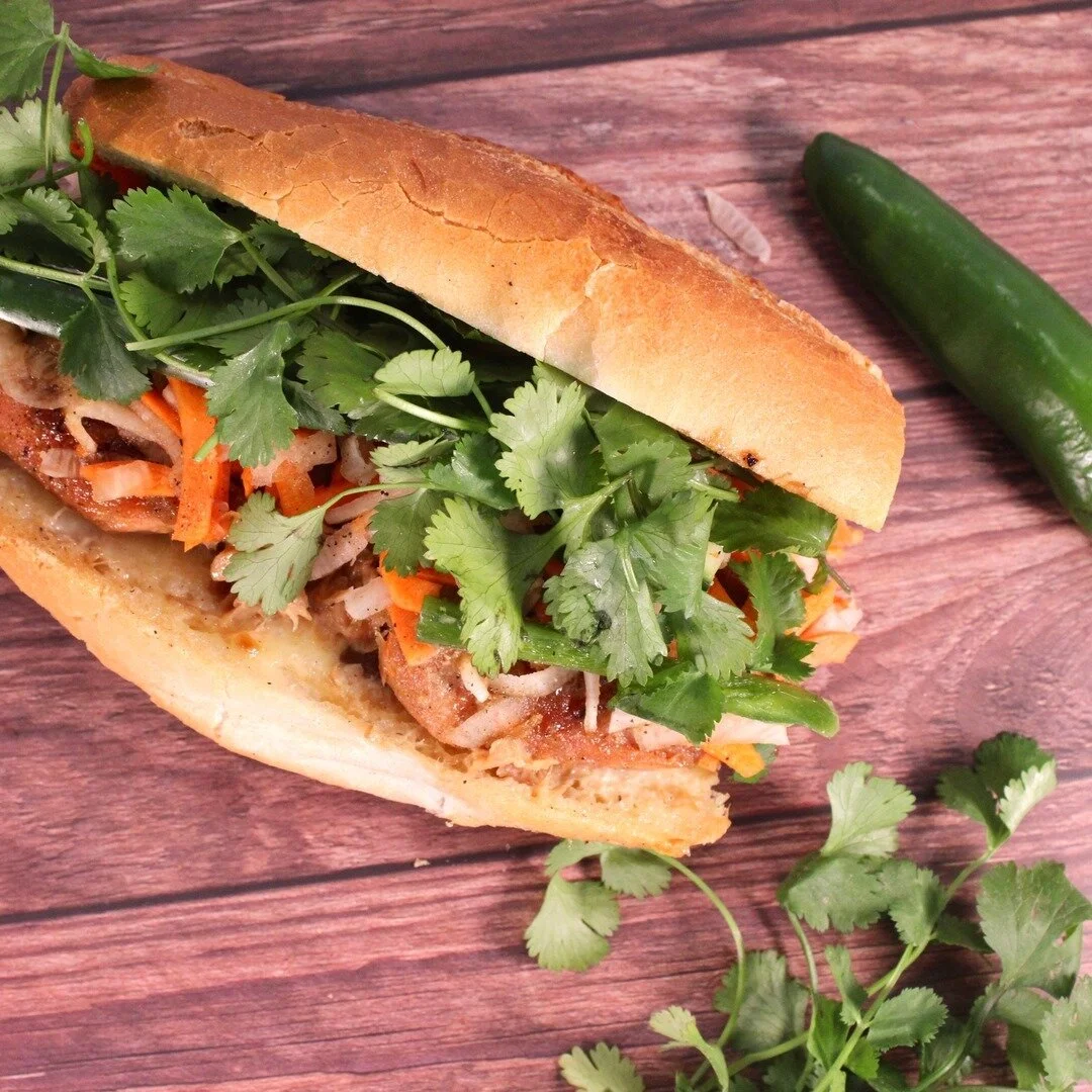 Try our Salmon Banh Mi this lent season! Made with sous vide Salmon, Vietnamese buttery mayo, cucumber, pickled carrots &amp; daikon, cilantro, jalapenos with a dash of seasoning sauce in a crispy baguette. A delicious alternative!⠀⠀⠀⠀⠀⠀⠀⠀⠀
⠀⠀⠀⠀⠀⠀⠀⠀⠀