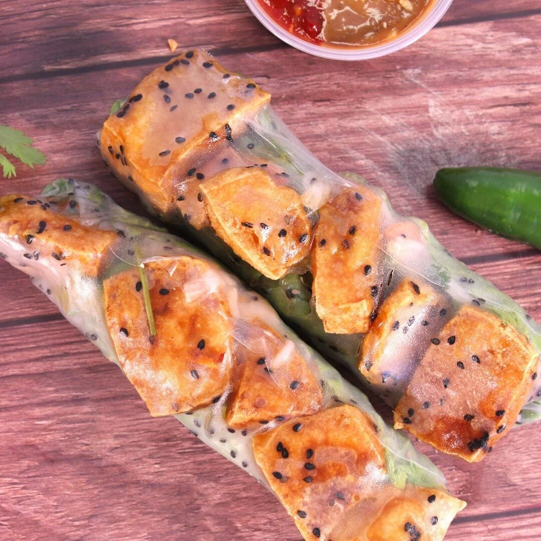 Our Crispy Toft Spring Rolls are an awesome Vegetarian choice! You get all of the flavors, protein, and they're gluten free! Made with Crispy Tofu wrapped with rice paper, vermicelli, cucumber, lettuce, pickled carrots &amp; daikon, and mint. Served 