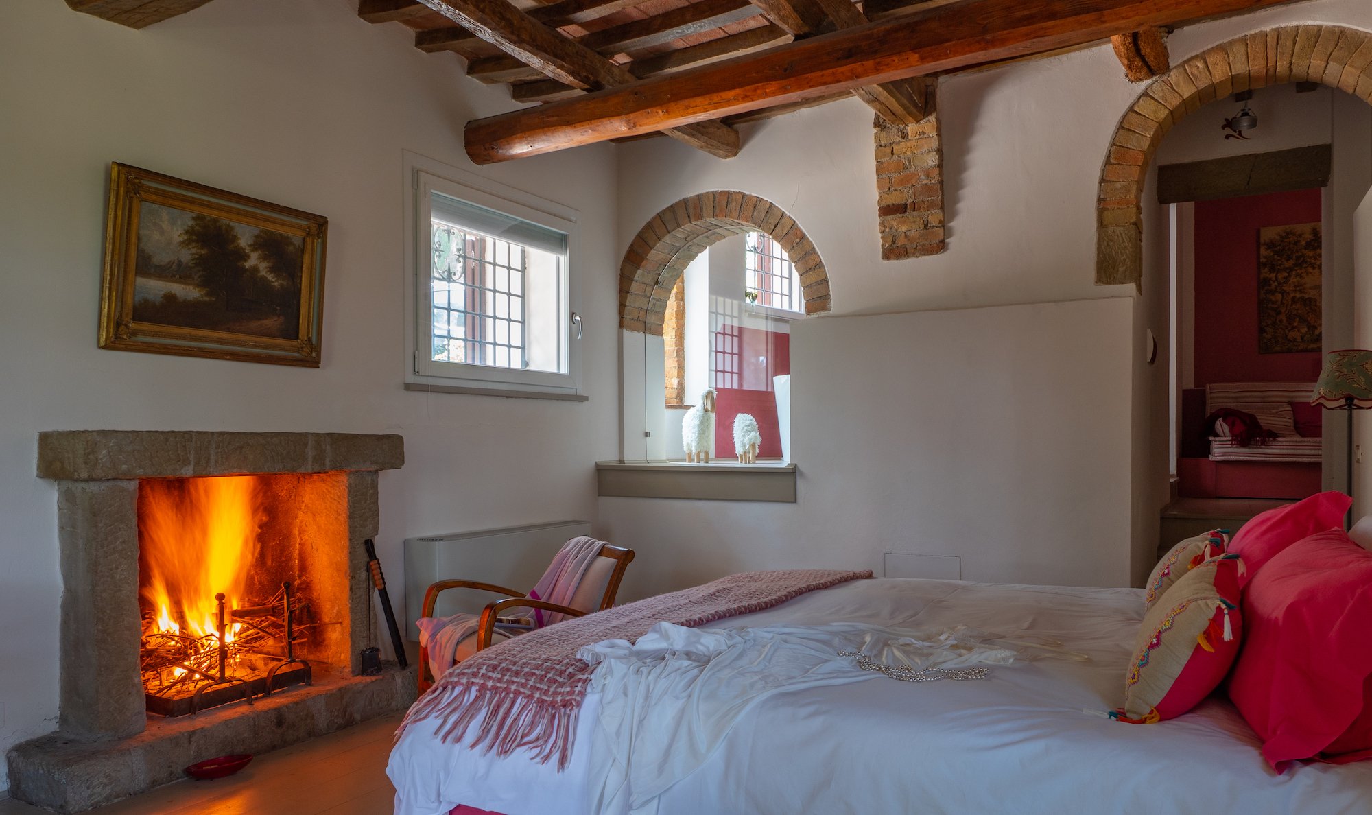 Relais Casamassima Suite 4 Honeymoon_bedroom&fireplace.jpg