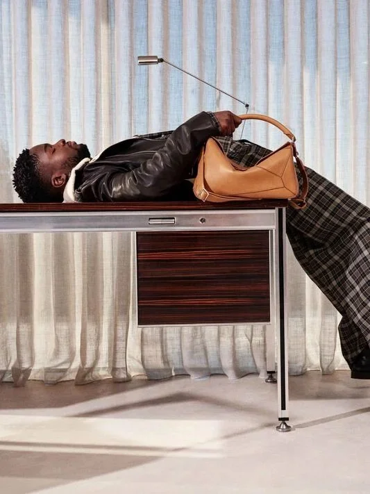 Loewe FW25 blending surreal minimalism with sculptural accessories