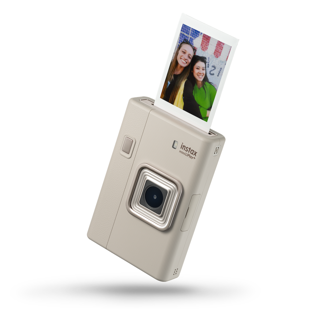 (PNG) instax mini LiPlay+ - Promotional images - 01 Sand Beige - Hero With Photo_0379_Stack-2RT.png