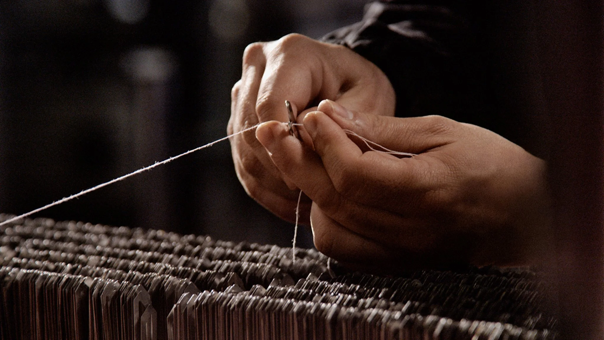 Finishing by the artisan on the Jacquard loom.jpg