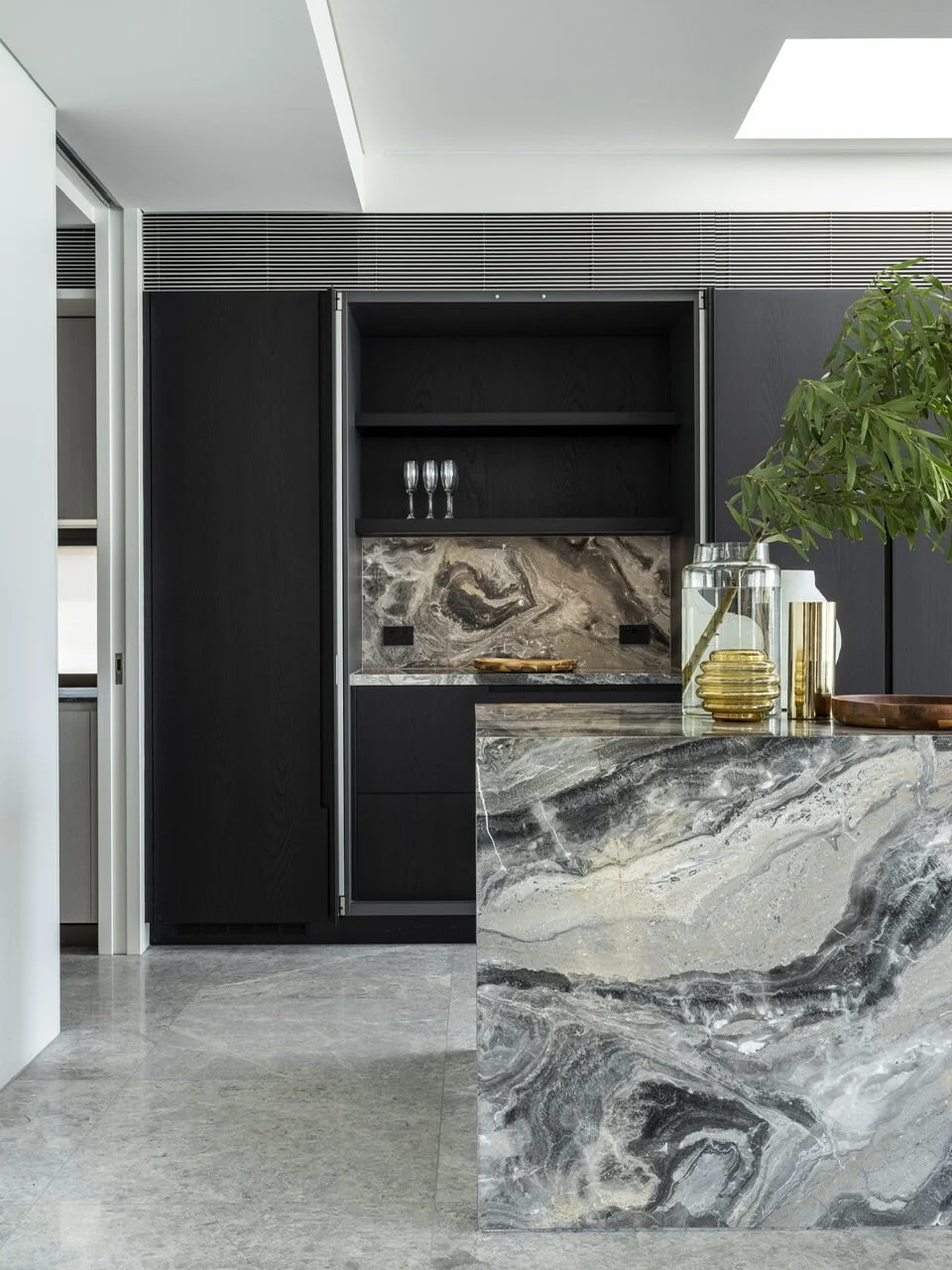  Contemporary sophisticated minimalist residential house interior kitchen with natural stone and wood 