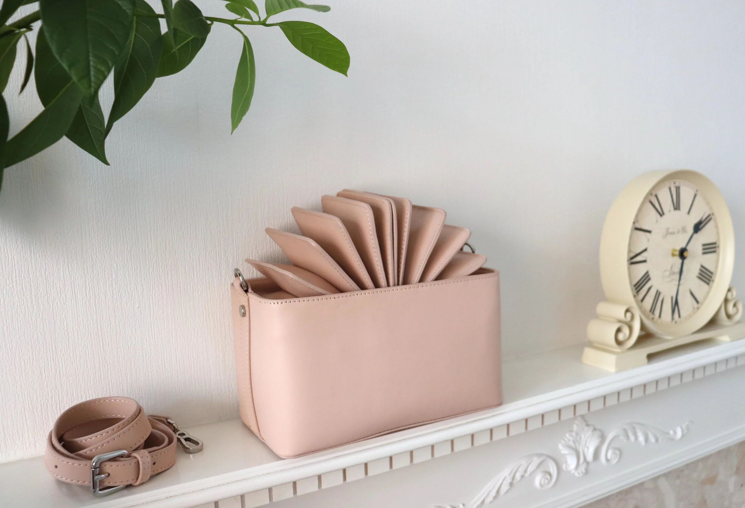 YLY DESIGN STUDIO:
PINK ACCORDIAN SHOULDER BAG
