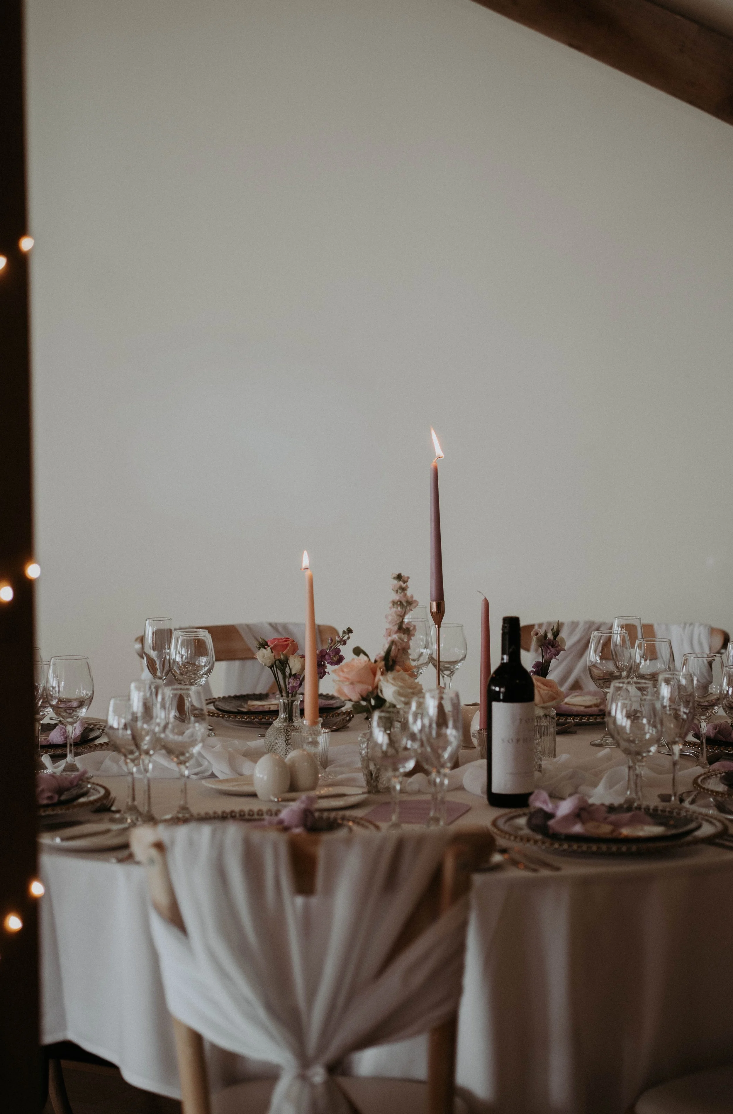 Table candle centrepiece with charger plates and candles