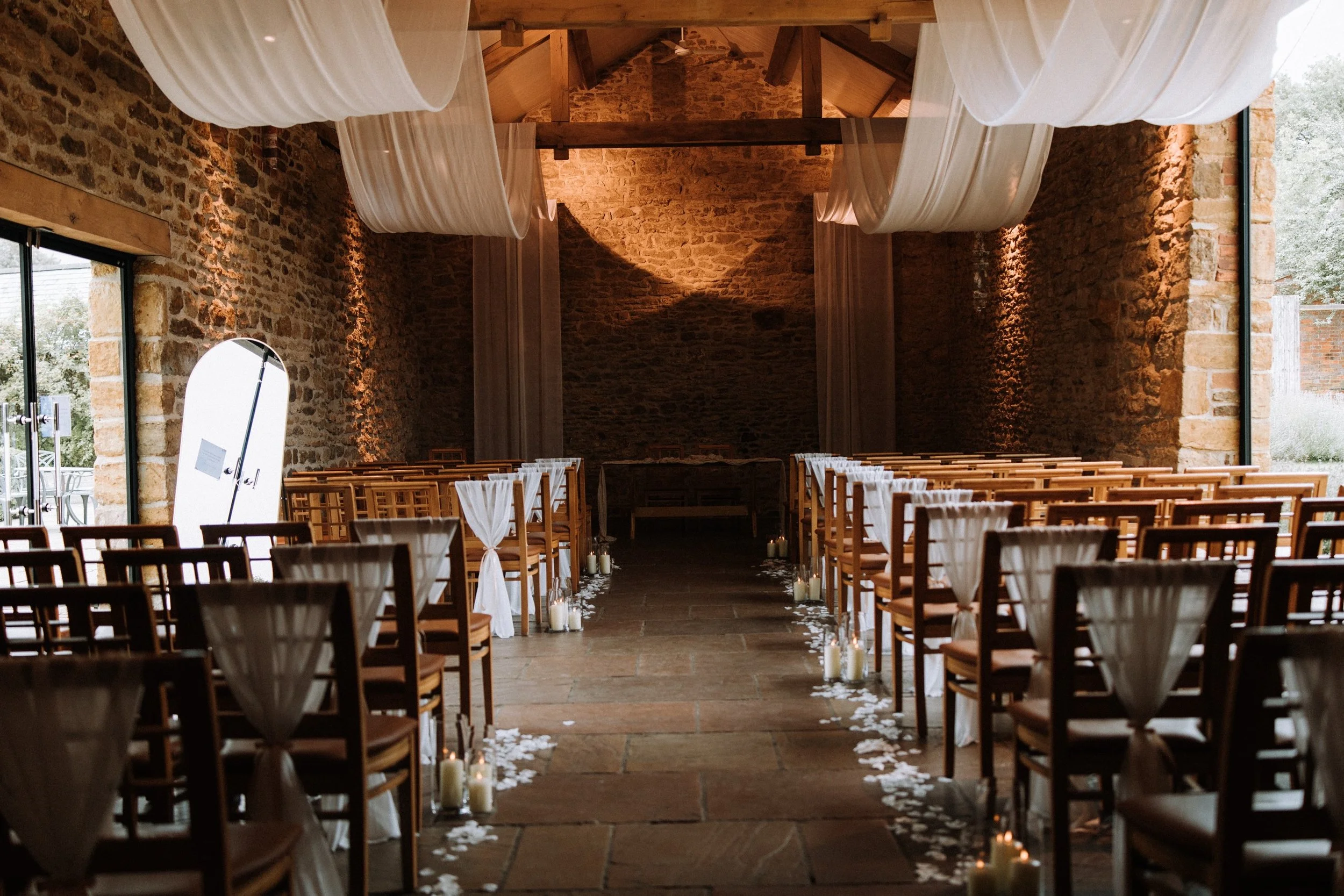 D R A P E S // Another booking today for our gorgeous beam drapes at the STUNNING @dodfordmanor!

What could be more romantic than walking down the aisle beneath clouds of floaty fabric? Dreamy&hellip; 💭✨ @ayellephoto 

#weddingdecor #weddingdecorat