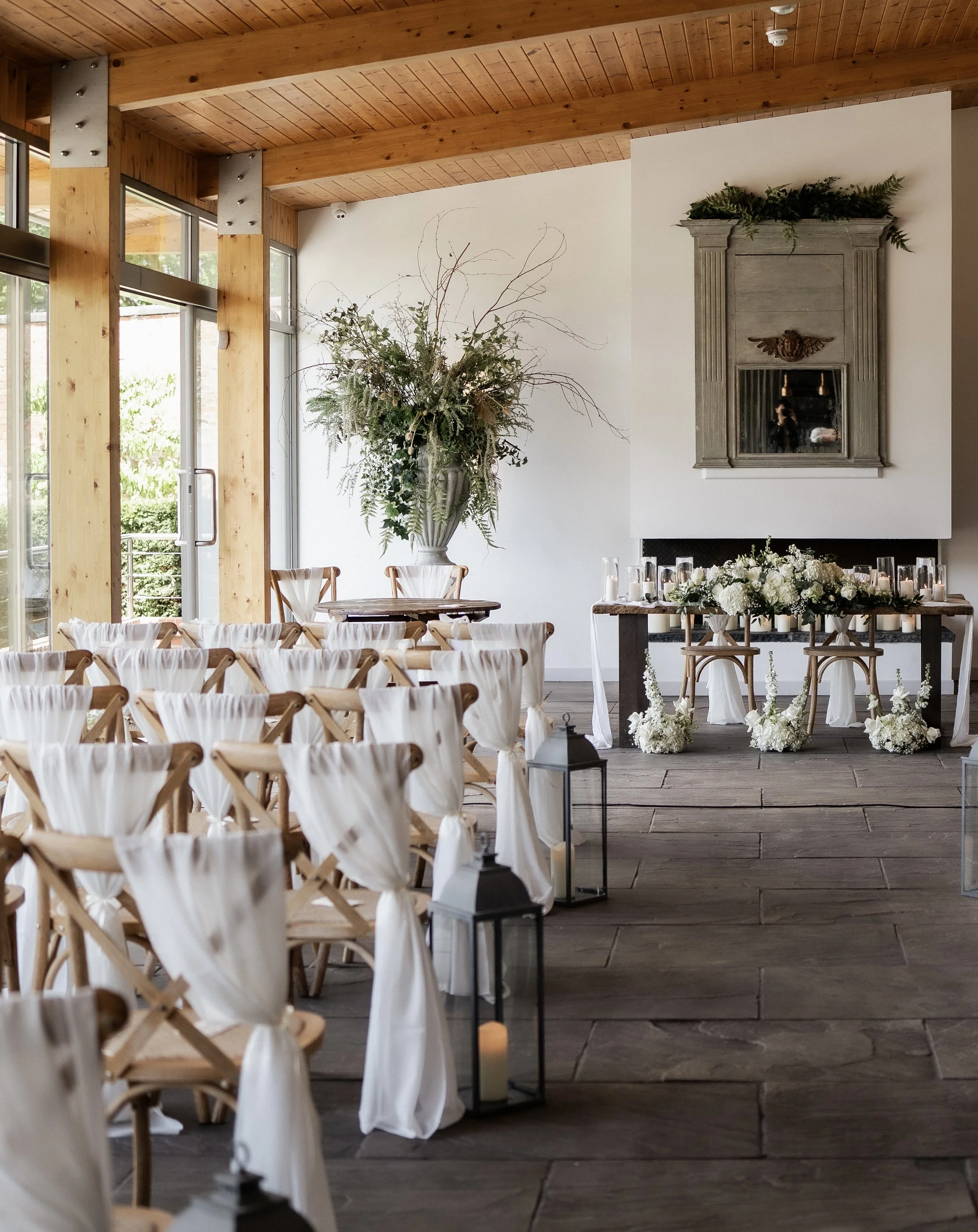 Ceremony room styling with chair drapes down the aisle