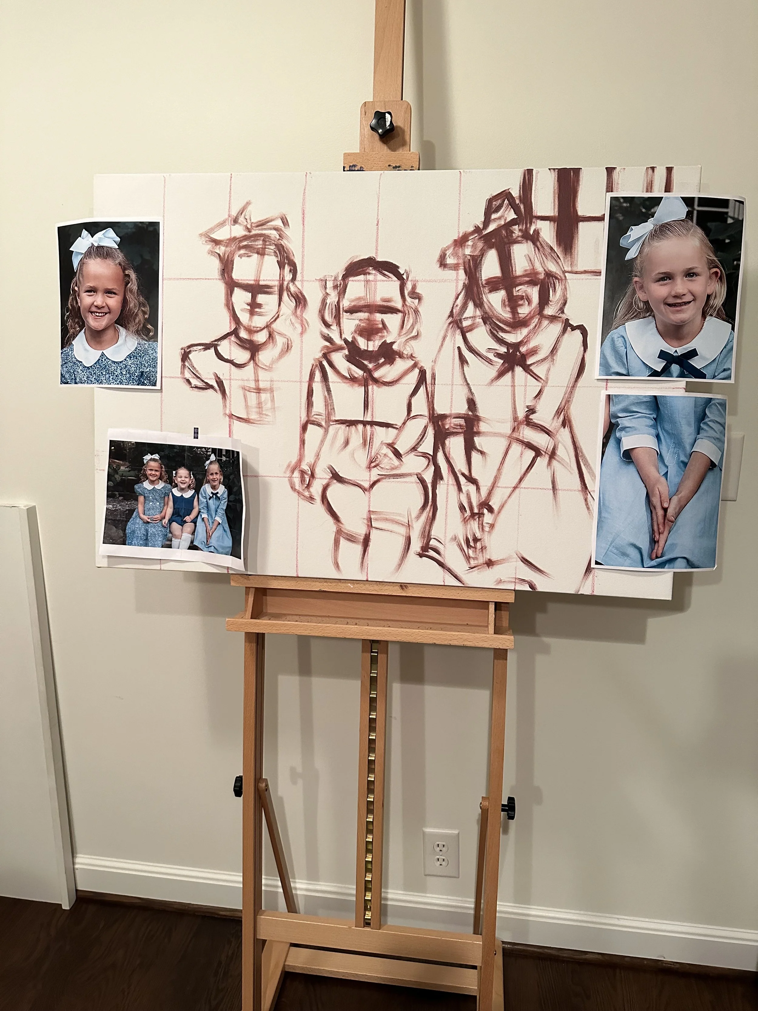 The canvas and reference photos are carefully gridded, and a layer of burnt ember shapes begins to establish the composition, mapping out where light, form, and movement will take shape.