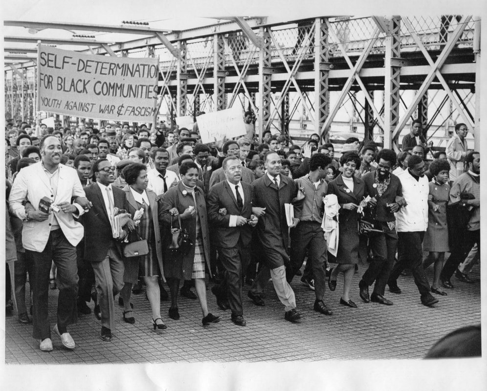 The Ocean Hill-Brownsville Governing Board and supporters march over the Brooklyn Bridge, March 1969. Photo courtesy of Heather Lewis.