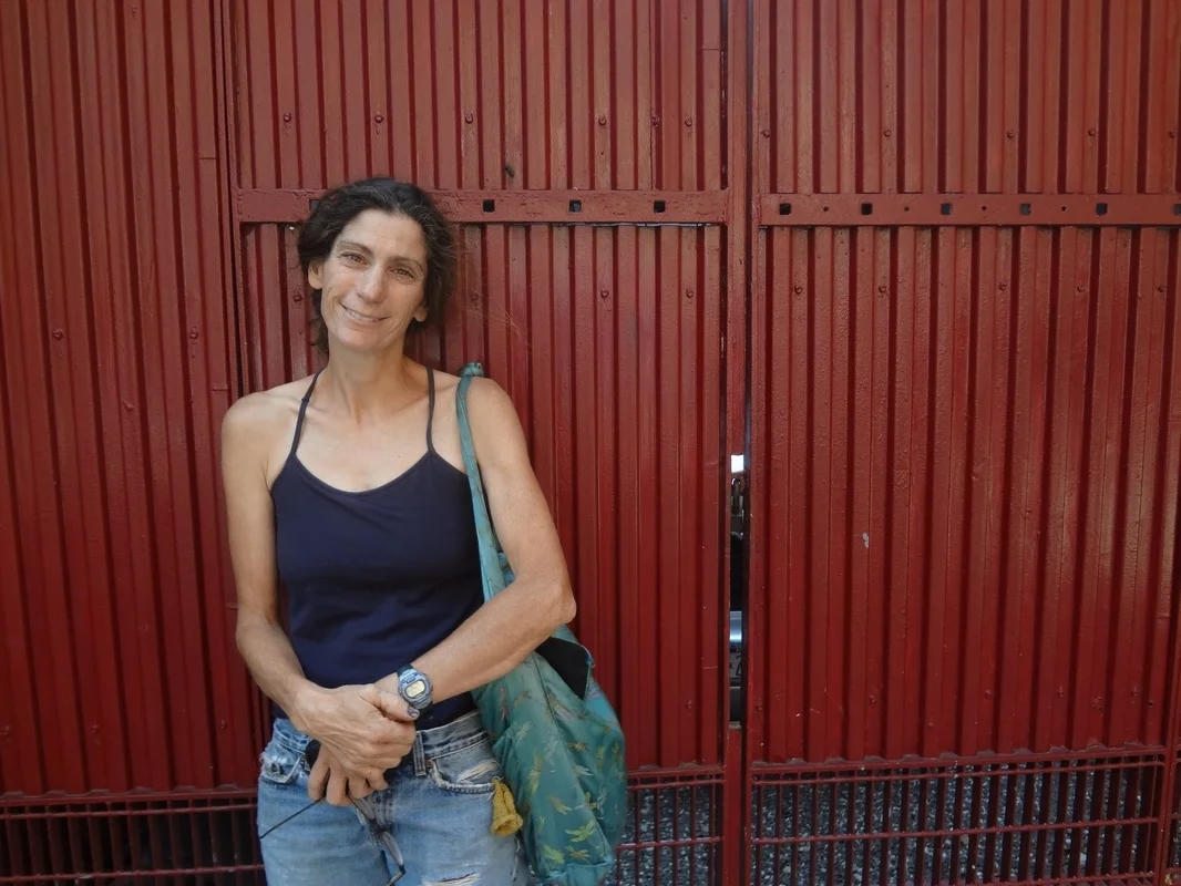 Marisa DeDominicis, b. 1962, grew up in Beacon, New York. Her parents were Italian immigrants and her background working-class. She went to Emerson College and got a degree in communications before moving to New York City in 1983 and, seeking to avoid an office job, becoming involved with community gardens and squats on the Lower East Side. DeDominicis was the first person to move into the squats on East Thirteenth Street, where she lived, worked, gave birth, and raised three children for almost twenty years. She married another squatter, architect Paul Castrucci, and they built a green, energy- self-sufficient home for their family on Rivington Street, on the Lower East Side (they are now separated). She worked for the Trust for Public Land for eighteen years and, at the time of this interview, was the director of Earth Matter, a non-profit promoting composting in New York City.