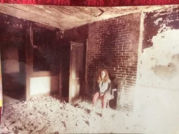 Marisa DeDominicis in 539 East 13 Street, apt. 3a, April 1984. Demolition of the ceiling plaster had just been completed.