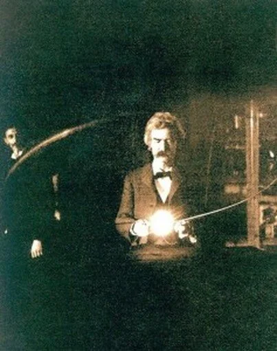 Mark Twain at Tesla’s laboratory, 1893. Tesla is in the background. From T.C. Martin, “Tesla’s Oscillators and Other Inventions,” The Century Magazine, 49:916-33 (April 1895), Fig. 13.