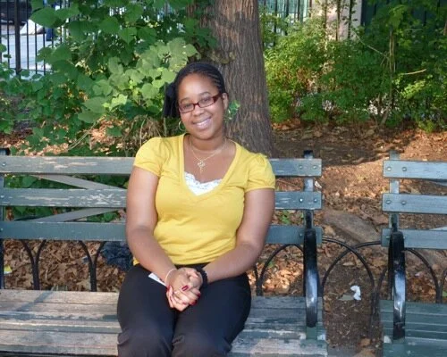 An interviewee smiles for the camera in Brower Park, a popular hangout spot for Crown Heights youth. Photo by the author.