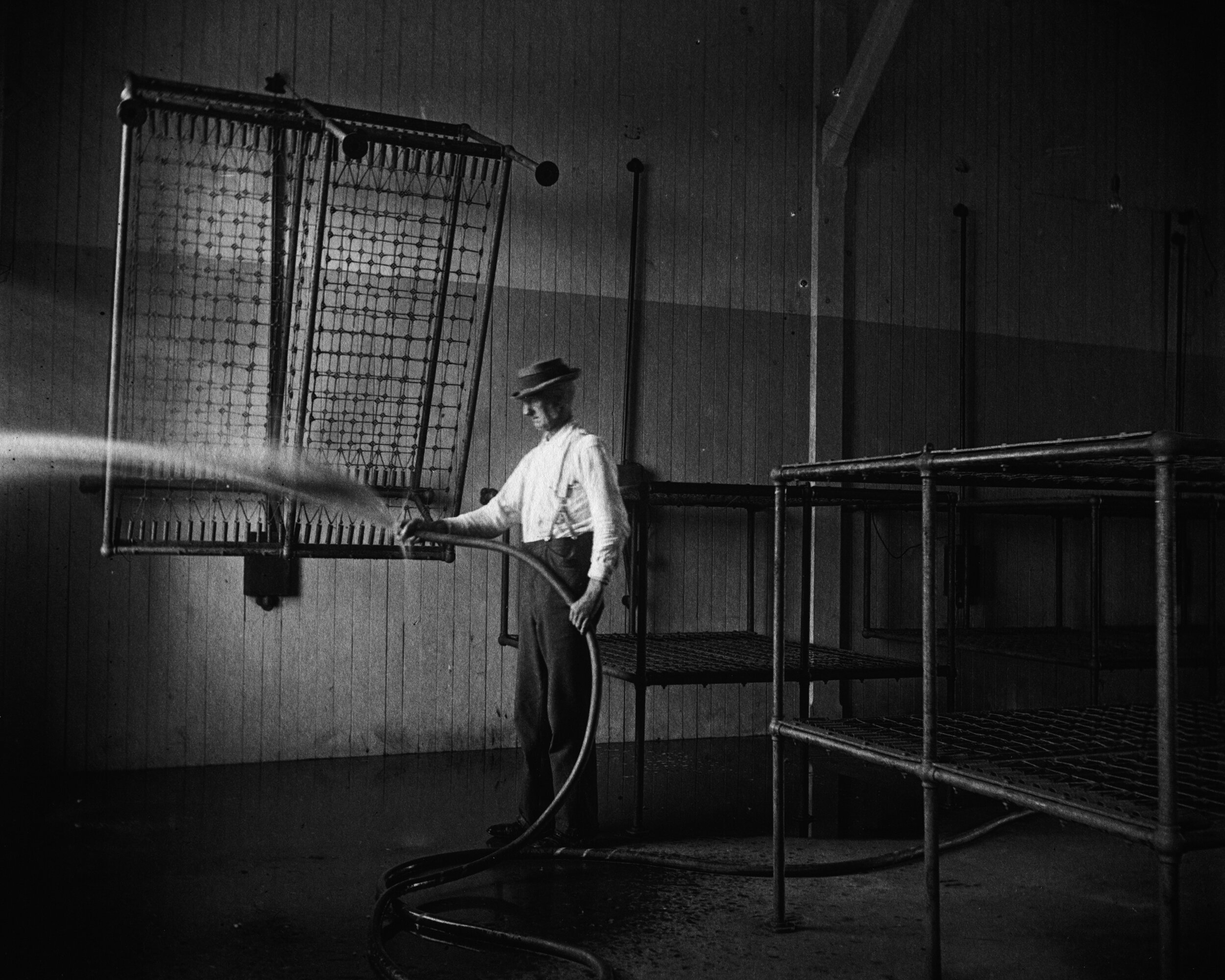   Hosing out beds, 1901  Collection of Historic Richmond Town, 50.015.1698 