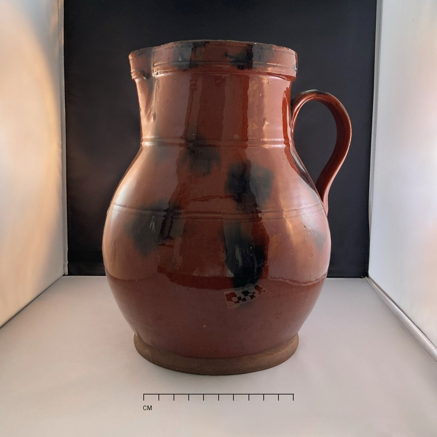   Redware pitcher from Preservation Long Island’s local redwares collection.  Photographed by Allison McGovern 