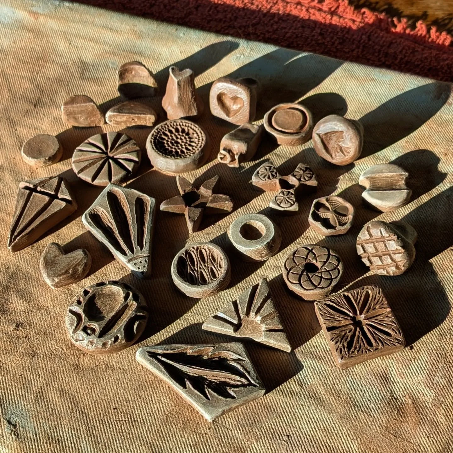 A BIG thank you to everyone who came out on Saturday for the market!
.
In other news, I've been experimenting with carving some stamps out of clay to use in my new pottery hobby. I finally filled the little kiln my friend has and we will be bisque fi