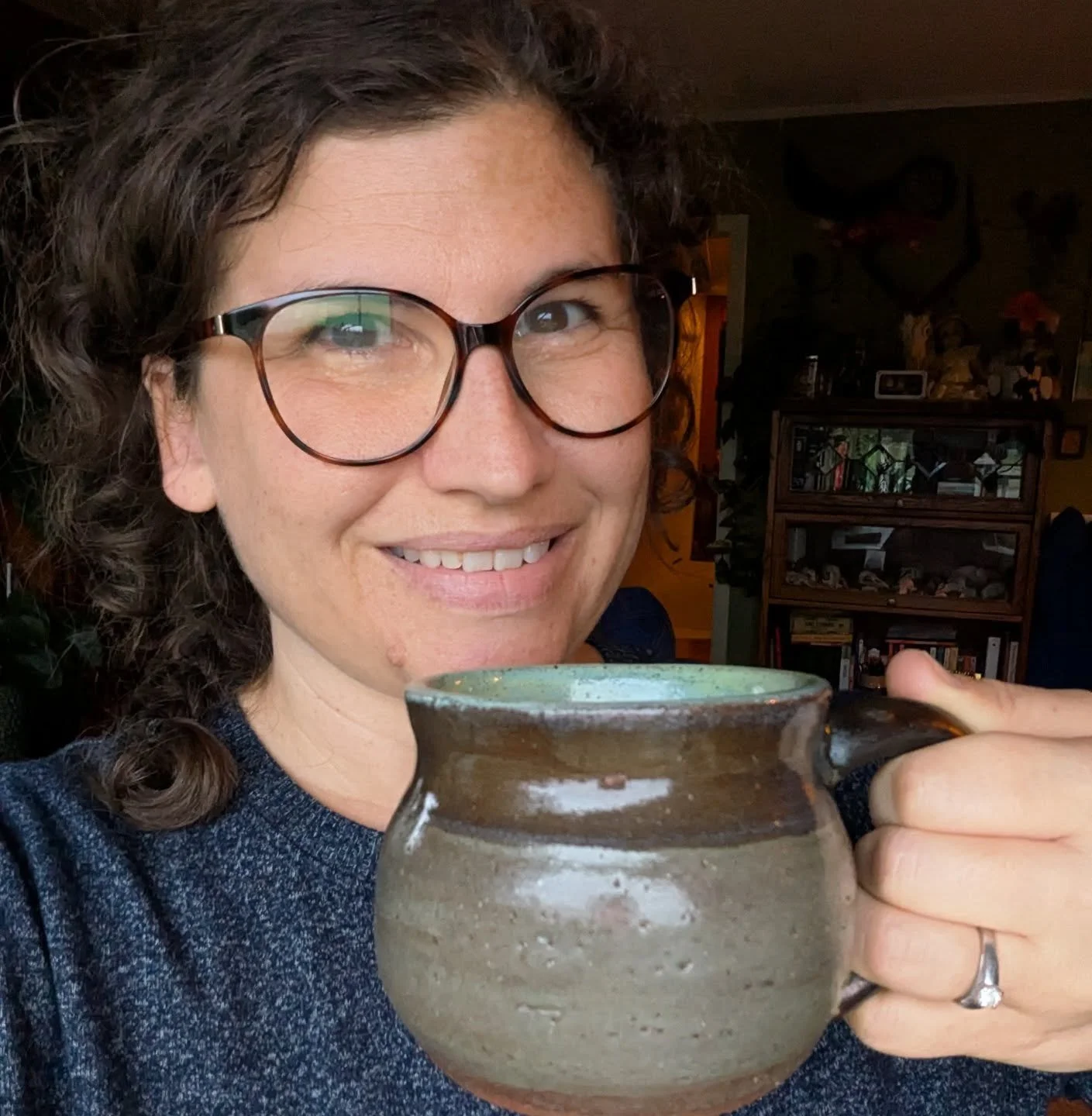 Drinking my first cup of coffee out of my first mug! It has been a few weeks wait for this moment, but I finally got to unload my first kiln of glazed pottery and it was like Christmas morning. I'm keeping about half of what I made and the rest is go
