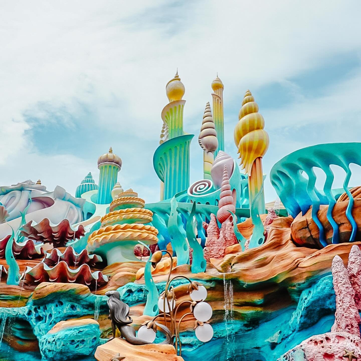 In honor of world princess week, here are some photos I took of King Triton&rsquo;s castle at Tokyo DisneySea 🐚 Seeing the castle in person made me so emotional. This movie just means so much to me. I felt as if I had walked (swam?) right into the f
