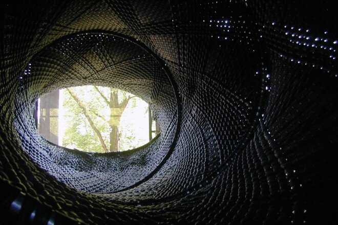 COCOON lounge space woven from bicycle inner  tubes.
