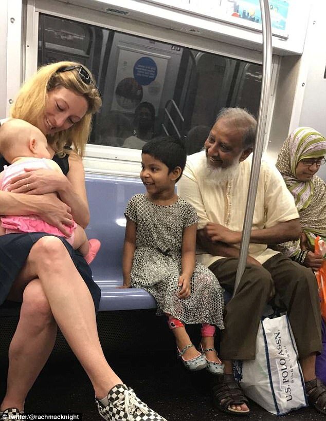 white-woman-smiling-Muslim-family.jpeg